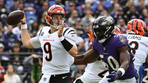 Joe Burrow throwing a pass against the Ravens.